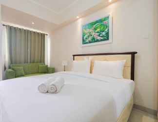 Bedroom 2 Minimalist Studio Apartment at The Oasis Cikarang By Travelio