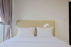 Bilik Tidur Elegant 1BR Branz BSD Apartment By Travelio