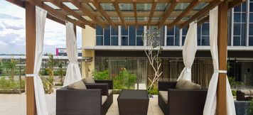 Bar, Cafe and Lounge 3 Elegant 1BR Branz BSD Apartment By Travelio