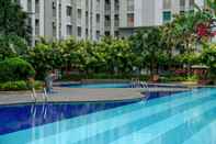 Swimming Pool Comfy Studio Room @ Green Bay Pluit Apartment By Travelio