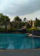 SWIMMING_POOL Brand New 2BR Grand Setiabudi Apartment By Travelio