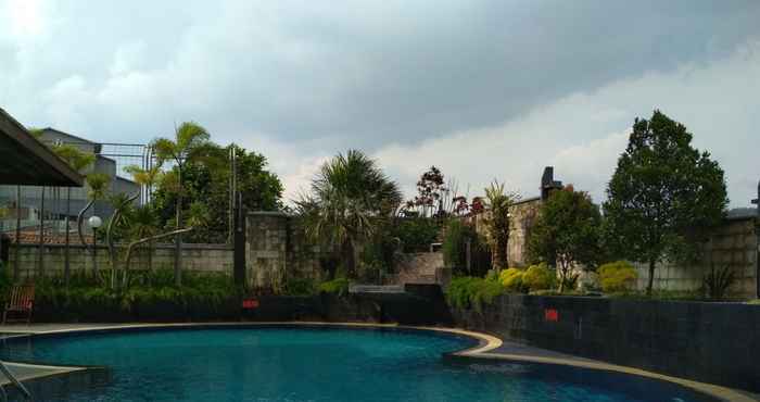 Swimming Pool Brand New 2BR Grand Setiabudi Apartment By Travelio