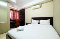 Bedroom Spacious Apartment at 2BR Metropark Condominium Jababeka By Travelio