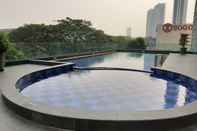 Swimming Pool Studio Apartment Near UPH at U Residence By Travelio