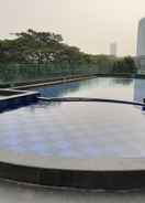SWIMMING_POOL Studio Apartment Near UPH at U Residence By Travelio