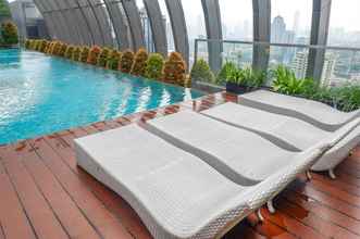 Swimming Pool 4 Comfy Style at 2BR L'Avenue Apartment By Travelio