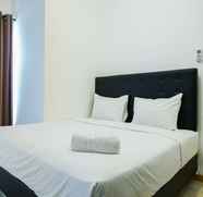 Bilik Tidur 3 2BR Minimalist and Warm at M-Town Apartment By Travelio 