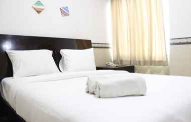 Bedroom 2 2BR Spacious & Comfy at Galeri Ciumbuleuit Apartment By Travelio