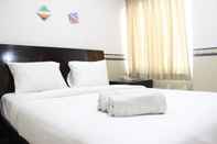 Bedroom 2BR Spacious & Comfy at Galeri Ciumbuleuit Apartment By Travelio