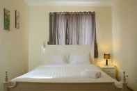 Bedroom Luxury Design 3BR Apartment Grand Palace Kemayoran By Travelio