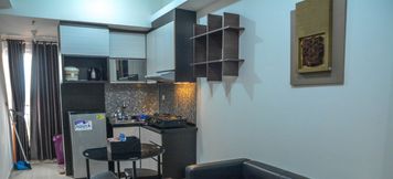 Lobby 4 Near Lippo Puri 2BR Puri Park View Apartment By Travelio