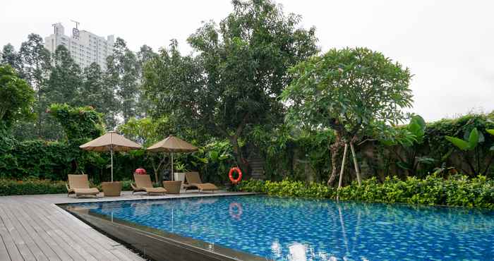 Swimming Pool 2BR Good Place Veranda Residence at Puri By Travelio