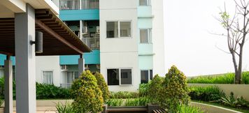 Common Space 5 The Nest Puri Studio Room Apartment By Travelio