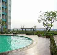 Kolam Renang 2 The Nest Puri Studio Room Apartment By Travelio