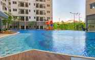 Swimming Pool 3 Warm and Cozy 2BR Park Signature Grande Apartment By Travelio