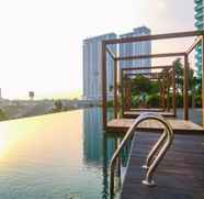 Swimming Pool 2 Studio Simple Apartment at Grand Kamala Lagoon By Travelio