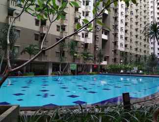 Swimming Pool 2 2BR Parquette Gateway Ahmad Yani Cicadas Apartment By Travelio