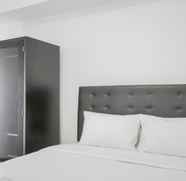 Kamar Tidur 5 2BR Minimalist and Comfy M-Town Apartment By Travelio