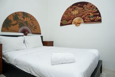 Bedroom 3BR Luxurious and Elegant at Vittoria Apartment By Travelio