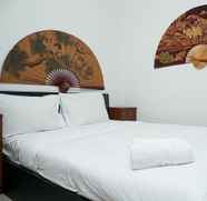 Bedroom 5 3BR Luxurious and Elegant at Vittoria Apartment By Travelio