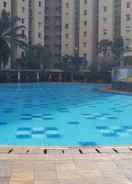 SWIMMING_POOL 2BR Comfortable Apartment at Mediterania Palace Residence By Travelio