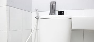 In-room Bathroom 4 2BR Modern Apartment at Grand Asia Afrika Residence By Travelio
