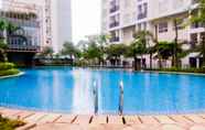 Swimming Pool 6 Minimalist 1BR Scientia Apartment By Travelio