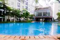 Swimming Pool Minimalist 1BR Scientia Apartment By Travelio