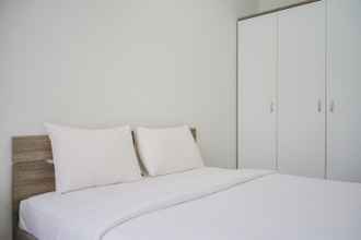 Bedroom 4 Minimalist 1BR Scientia Apartment By Travelio