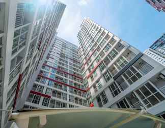 Exterior 2 Cozy 1BR Apartment @ Grand Taman Melati 2 By Travelio