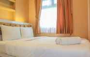 Bedroom 5 Homey 2BR Aparment at Green Pramuka near Mall By Travelio