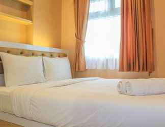 Bedroom 2 Homey 2BR Aparment at Green Pramuka near Mall By Travelio