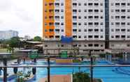 Kolam Renang 2 Homey 2BR Aparment at Green Pramuka near Mall By Travelio