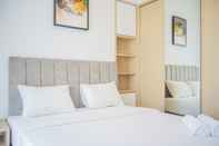 Kamar Tidur Comfy 1BR Apartment at Marigold Nava Park By Travelio