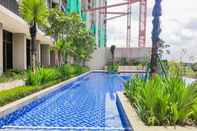 Lobi Comfy 1BR Apartment at Marigold Nava Park By Travelio