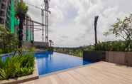Swimming Pool 3 Comfy 1BR Apartment at Marigold Nava Park By Travelio