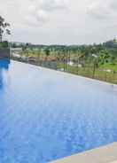 SWIMMING_POOL Comfy 1BR Apartment at Marigold Nava Park By Travelio