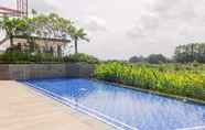 Kolam Renang 2 Comfy 1BR Apartment at Marigold Nava Park By Travelio