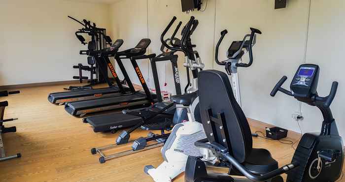 Fitness Center 1BR Furnished Tree Park Apartment BSD By Travelio