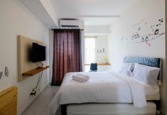 Bedroom 4 Studio Cozy Apartment at Akasa Pure Living BSD By Travelio