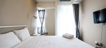 Bedroom 5 Studio Modern Akasa Pure Living BSD Apartment By Travelio