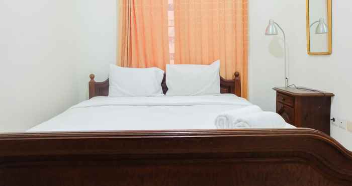 Phòng ngủ 2BR Homey & Vintage @ Sudirman Park Apartment By Travelio
