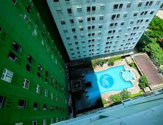 Exterior 2 Studio Spacious Room at Green Pramuka Apartment By Travelio