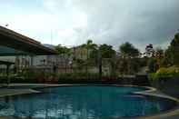 Swimming Pool ﻿Spacious Studio Room Apartment at Grand Setiabudi By Travelio