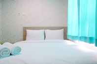 Bedroom 2BR Full Parquette at Cinere Bellevue Apartment By Travelio