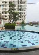 SWIMMING_POOL 2BR Full Parquette at Cinere Bellevue Apartment By Travelio