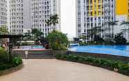 Swimming Pool 7 Modern 2BR The Springlake Summarecon Apartment By Travelio