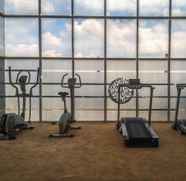 Fitness Center 3 Artistic 2BR The Oasis Apartment By Travelio