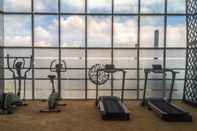 Fitness Center Artistic 2BR The Oasis Apartment By Travelio