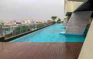 Swimming Pool 7 Comfy Studio Room Apartment at Menteng Park By Travelio